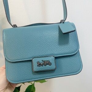 Coach Teal Blue Crossbody Bag with Adjustable Strap and Flap Closure